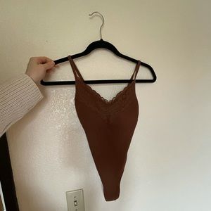 PINK VS brown bodysuit